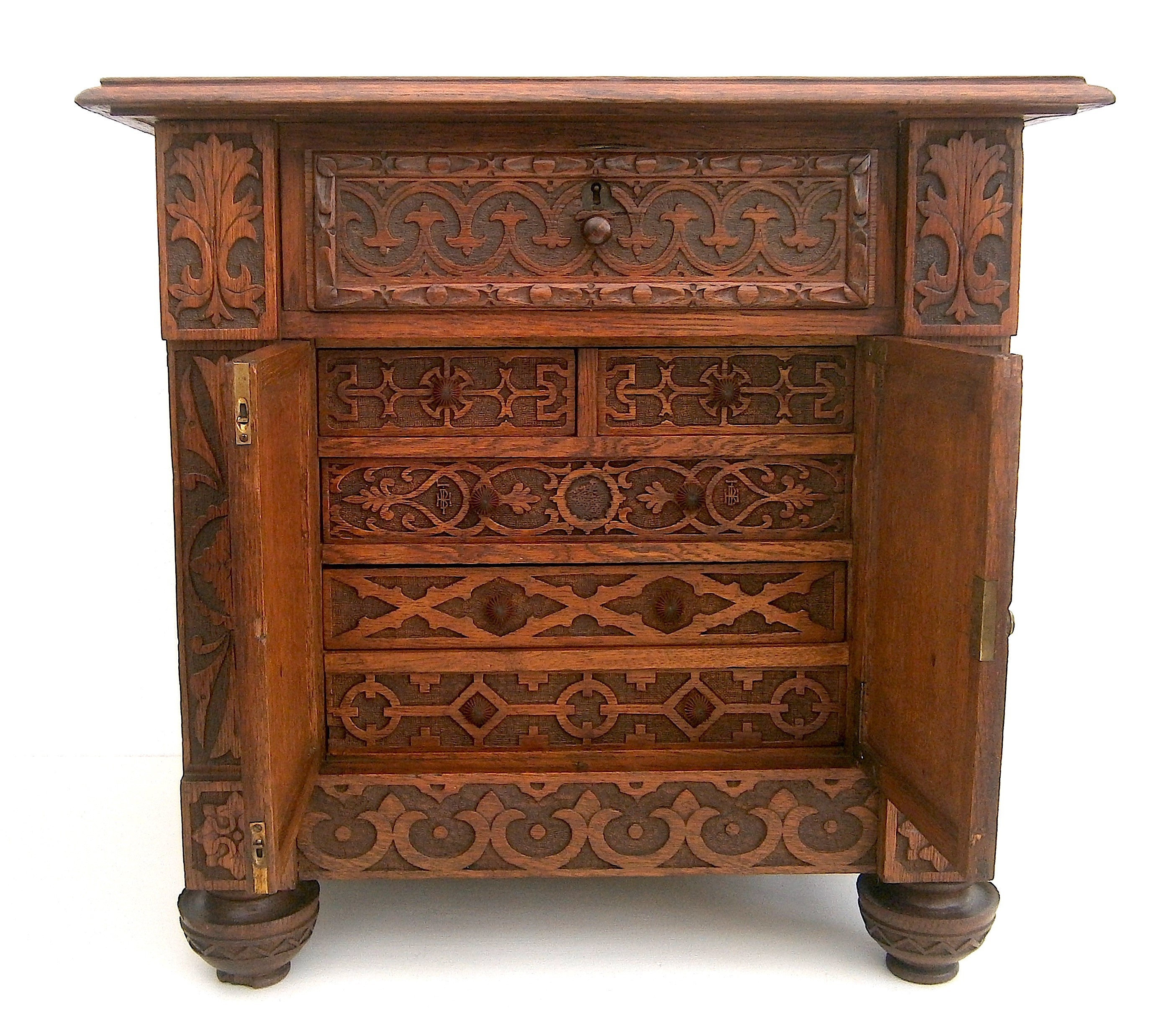 A Victorian carved oak table top collector's cabinet, width 58cm, depth 37cm, height 56cm